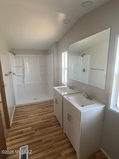 8401 South Kolb Road, Unit 168 Tucson, AZ 85756 - Photo 7 of 20 a bathroom with a sink a mirror and a shower