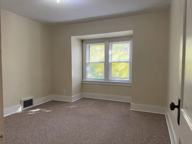 an empty room with a window