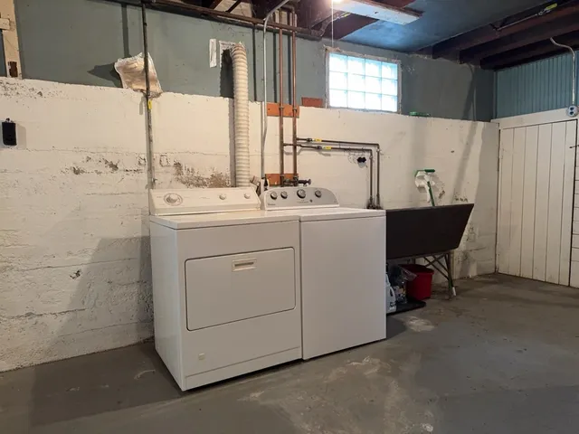 a utility room with cabinets