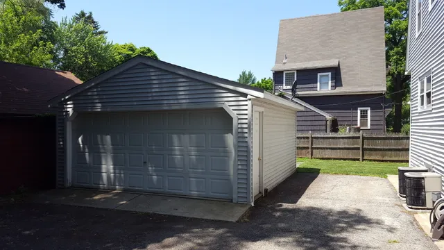 a front view of a house with a garage