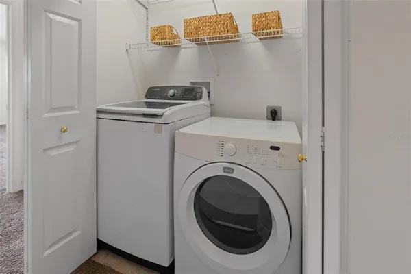 a view of a swimming pool with a outdoor seating