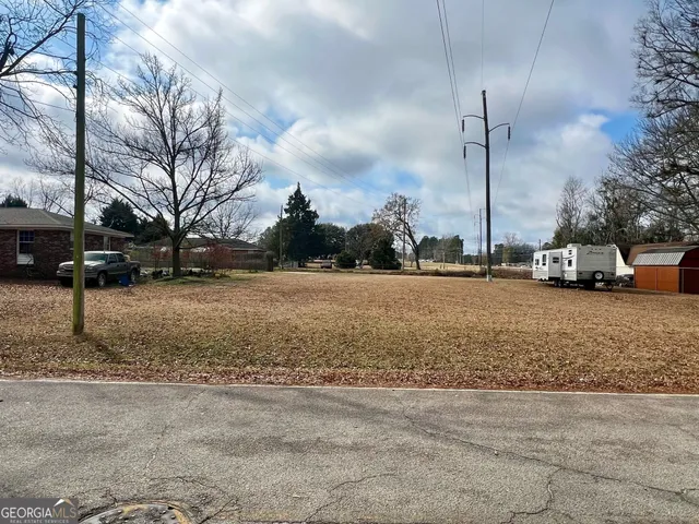 a view of road with a building