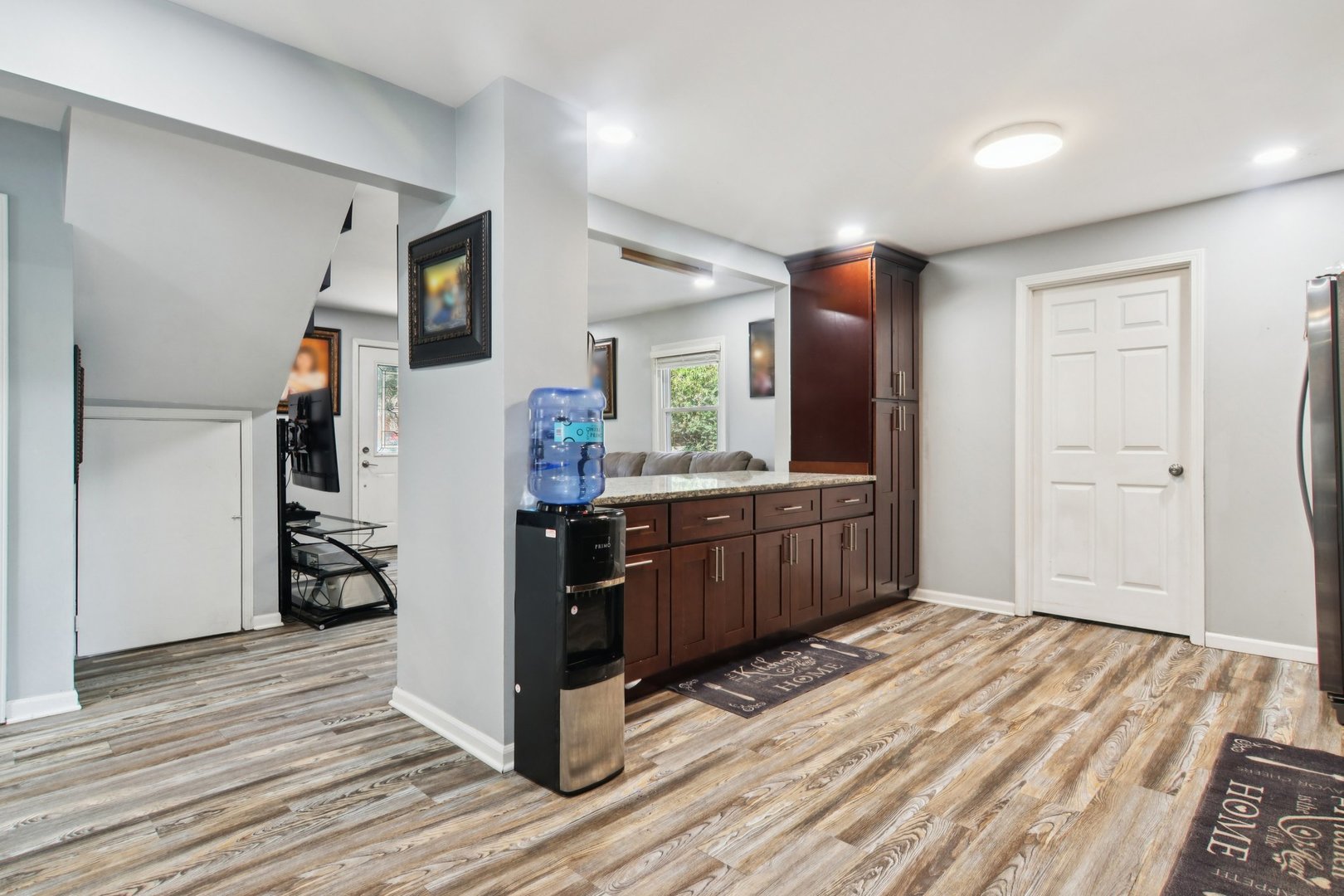 806 Spencer Street Joliet, IL 60433 - Photo 13 of 49 a kitchen view with wooden floor and electronic appliances