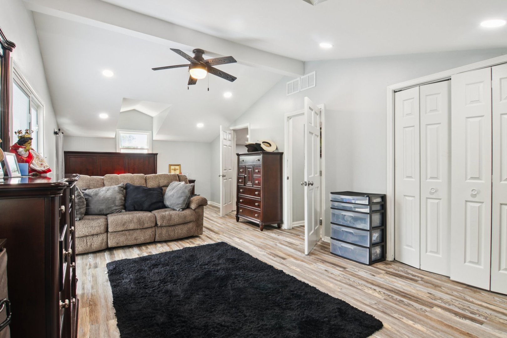 806 Spencer Street Joliet, IL 60433 - Photo 27 of 49 a living room with furniture and a ceiling fan