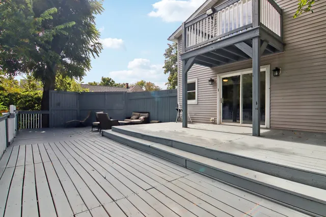 a view of a house with wooden floor and furniture