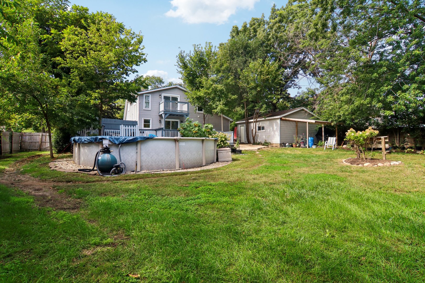 806 Spencer Street Joliet, IL 60433 - Photo 35 of 49 a view of a house with backyard and sitting area
