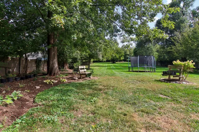 a view of a park with a slide