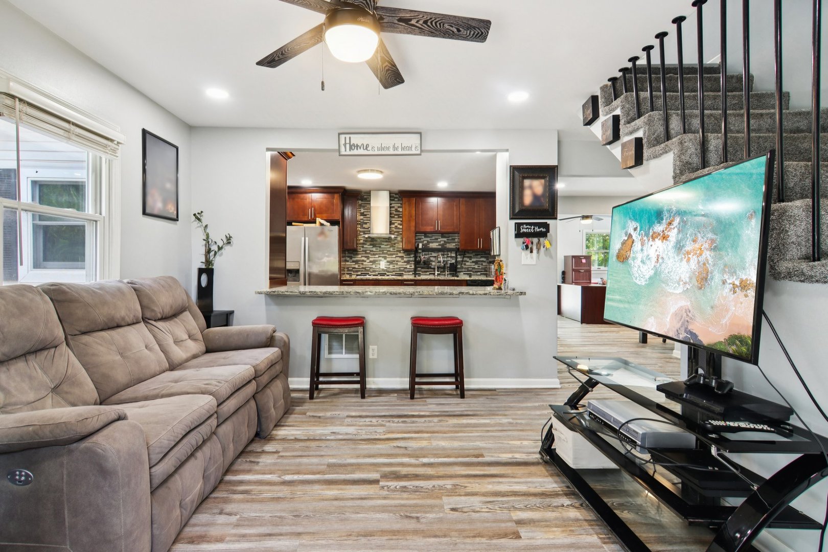 806 Spencer Street Joliet, IL 60433 - Photo 8 of 49 a living room with furniture and wooden floor