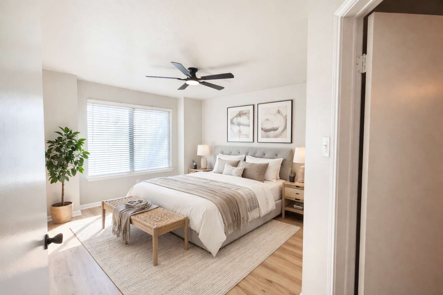 1730 Timber Ridge Road, Unit 152 Austin, TX 78741 - Photo 7 of 26 Bedroom featuring wood finished floors and a ceiling fan