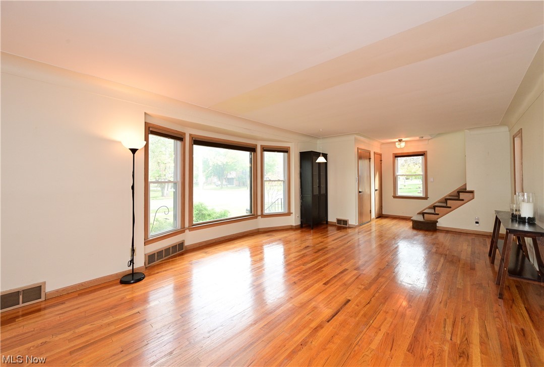 3798 Hillbrook Road Cleveland, OH 44118 - Photo 3 of 34 Unfurnished living room with light hardwood flooring