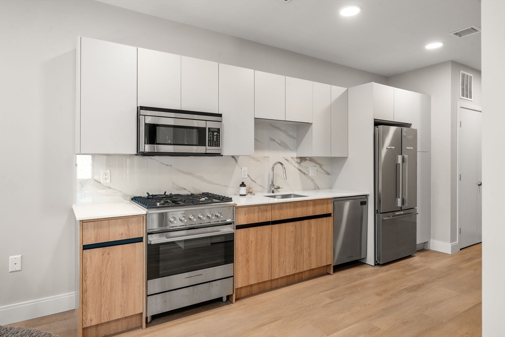 249 Corey Road, Unit 407 Boston, MA 02135 - Photo 1 of 22