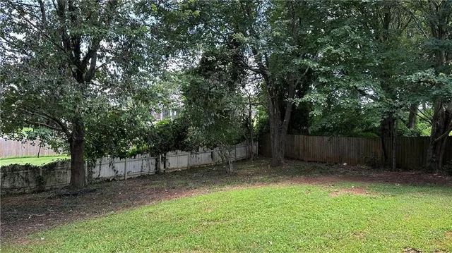 a view of backyard with trees