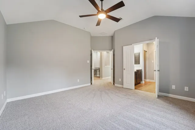 a bathroom with a sink double vanity and a mirror