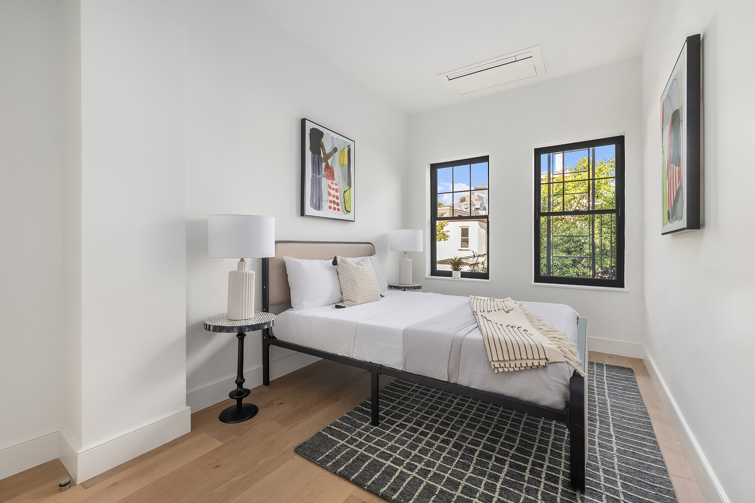 665 Degraw Street, Unit 2 Brooklyn, NY 11217 - Photo 7 of 11 a bedroom with a bed and a window