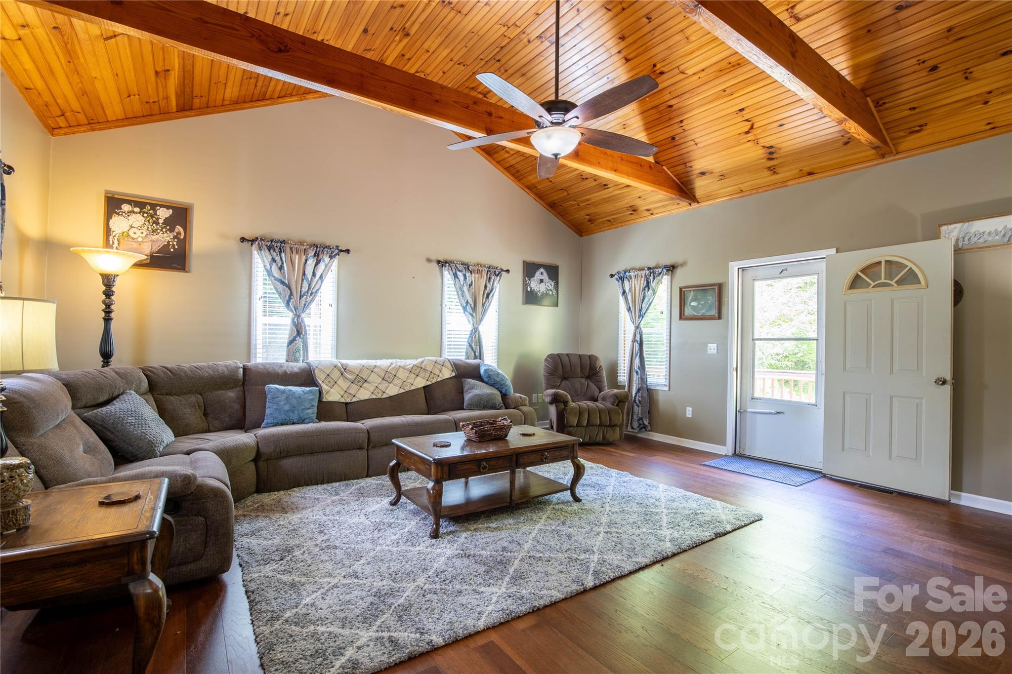 84 Sheets Farm Road Bakersville, NC 28705 - Photo 28 of 42 a living room with furniture and wooden floor