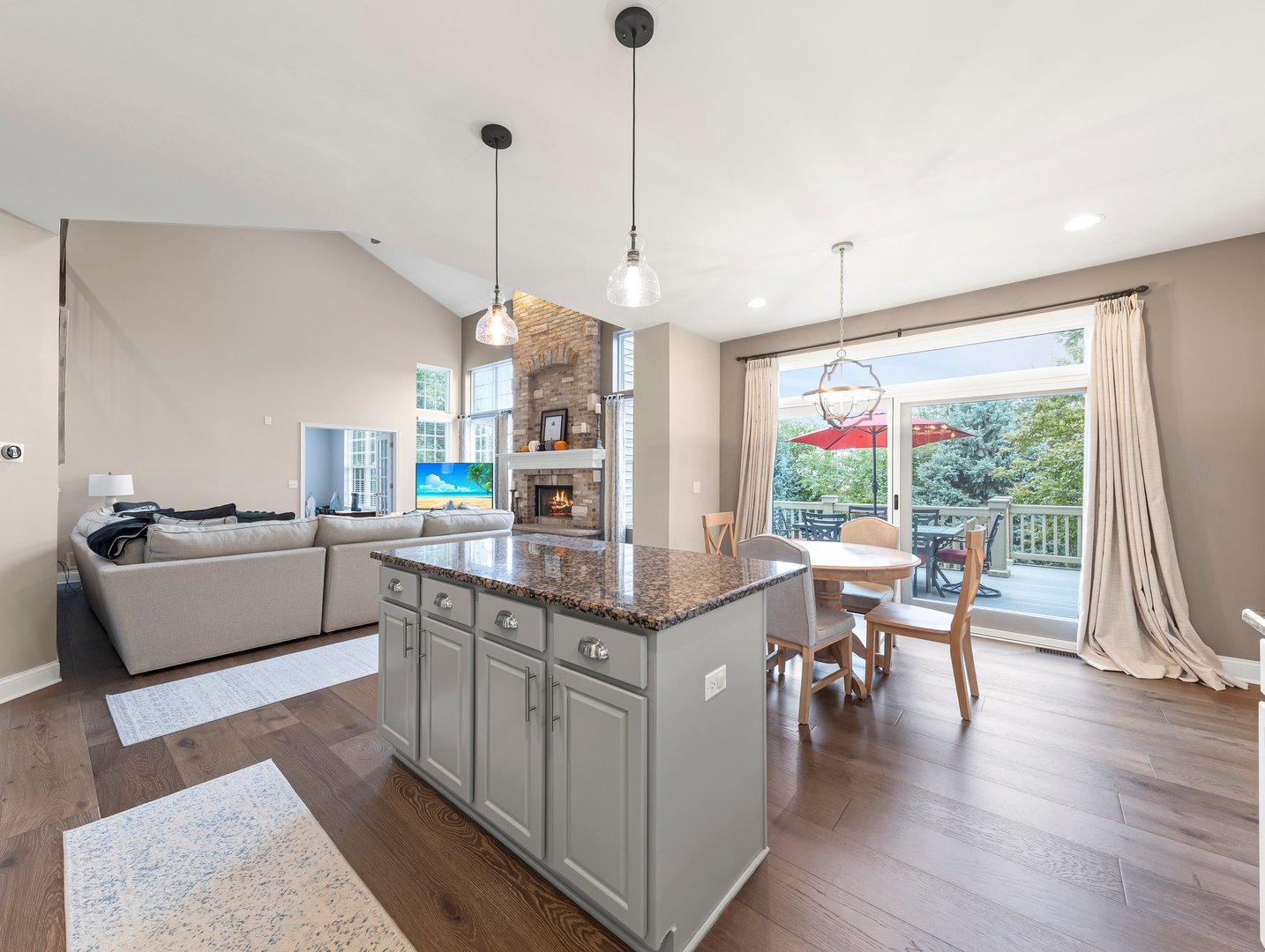 26305 Mapleview Drive Plainfield, IL 60585 - Photo 11 of 40 a open kitchen with stainless steel appliances granite countertop a stove and cabinets