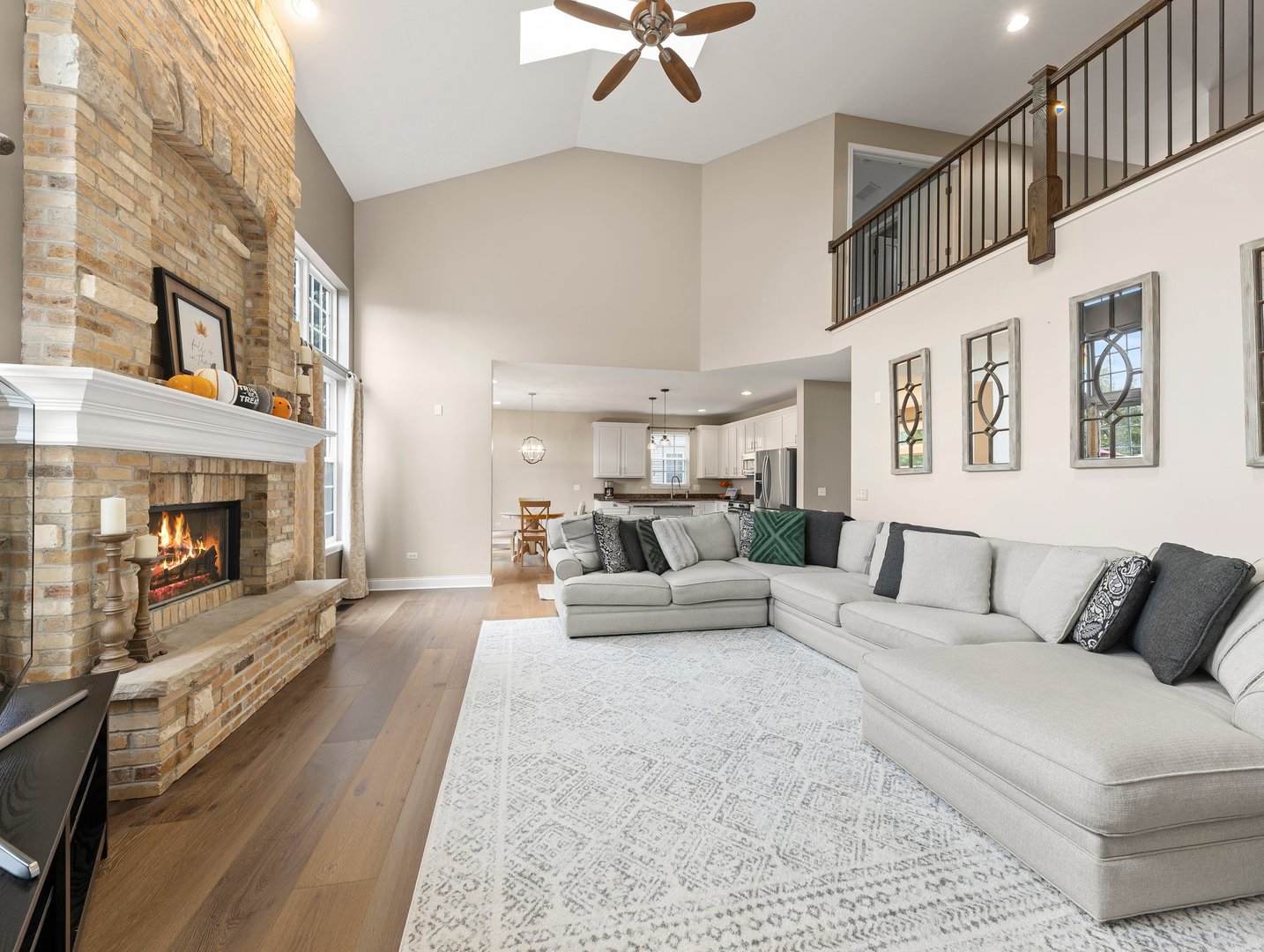 26305 Mapleview Drive Plainfield, IL 60585 - Photo 15 of 40 a living room with furniture and a fireplace