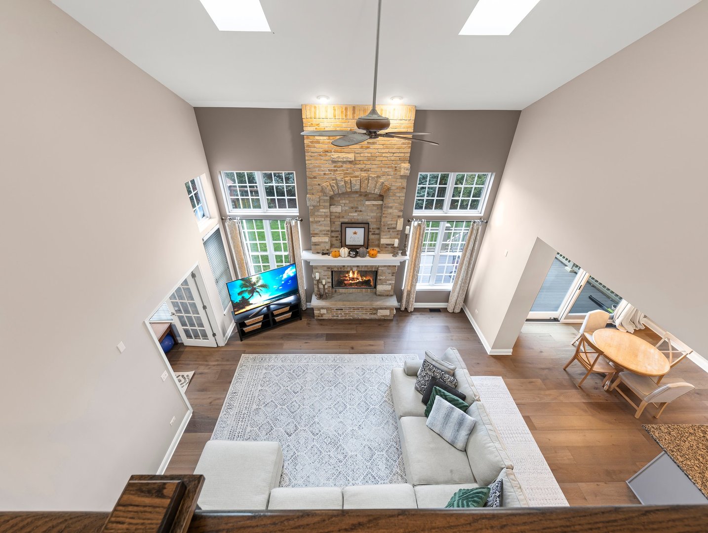 26305 Mapleview Drive Plainfield, IL 60585 - Photo 32 of 40 a living room with furniture and a fireplace