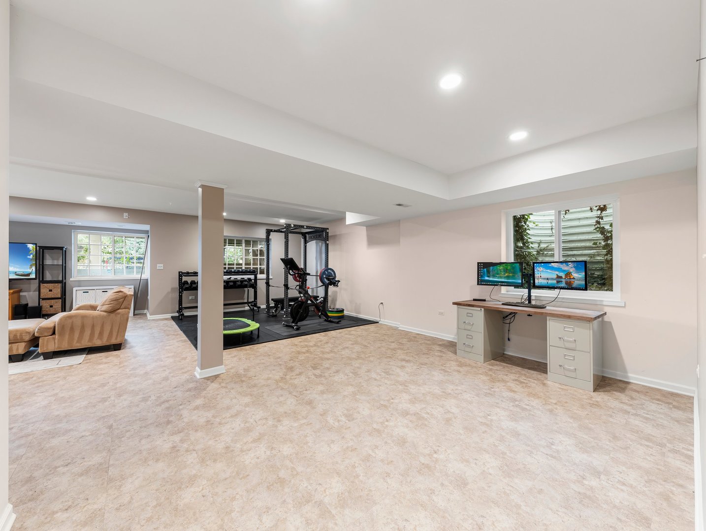 26305 Mapleview Drive Plainfield, IL 60585 - Photo 33 of 40 a living room with furniture and a flat screen tv