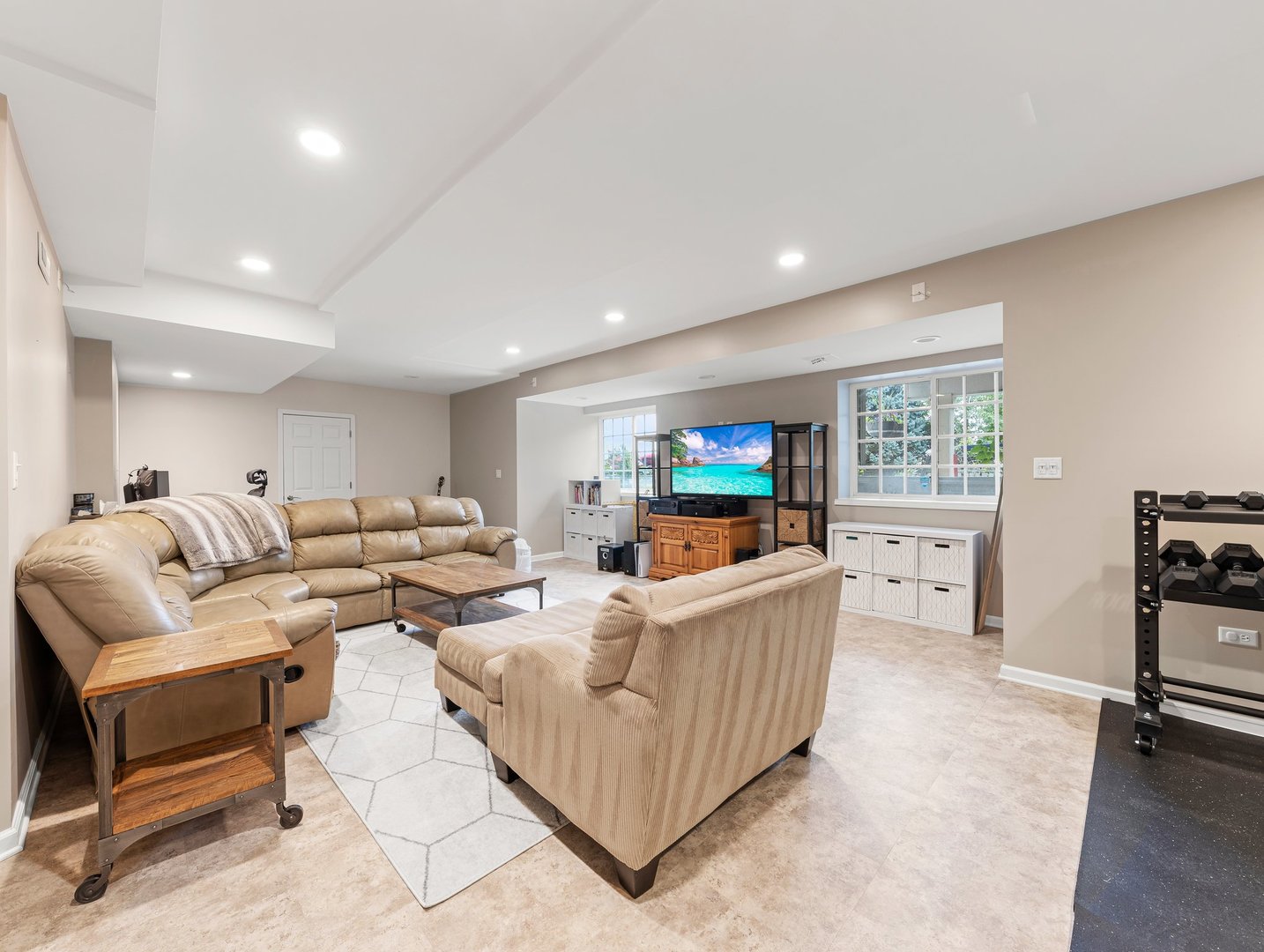 26305 Mapleview Drive Plainfield, IL 60585 - Photo 34 of 40 a living room with furniture and a flat screen tv