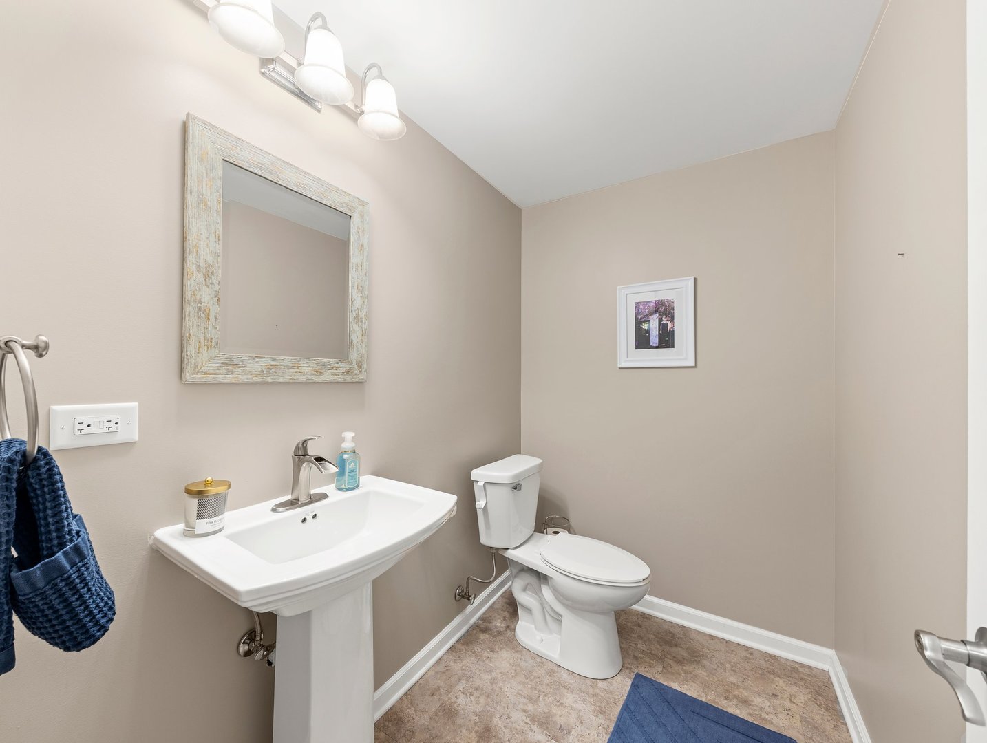 26305 Mapleview Drive Plainfield, IL 60585 - Photo 36 of 40 a bathroom with a toilet a sink and mirror