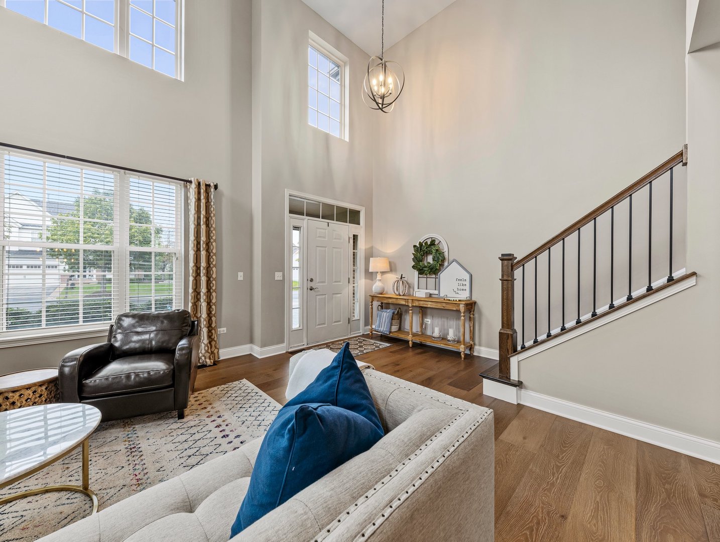 26305 Mapleview Drive Plainfield, IL 60585 - Photo 6 of 40 a living room with furniture and a large window