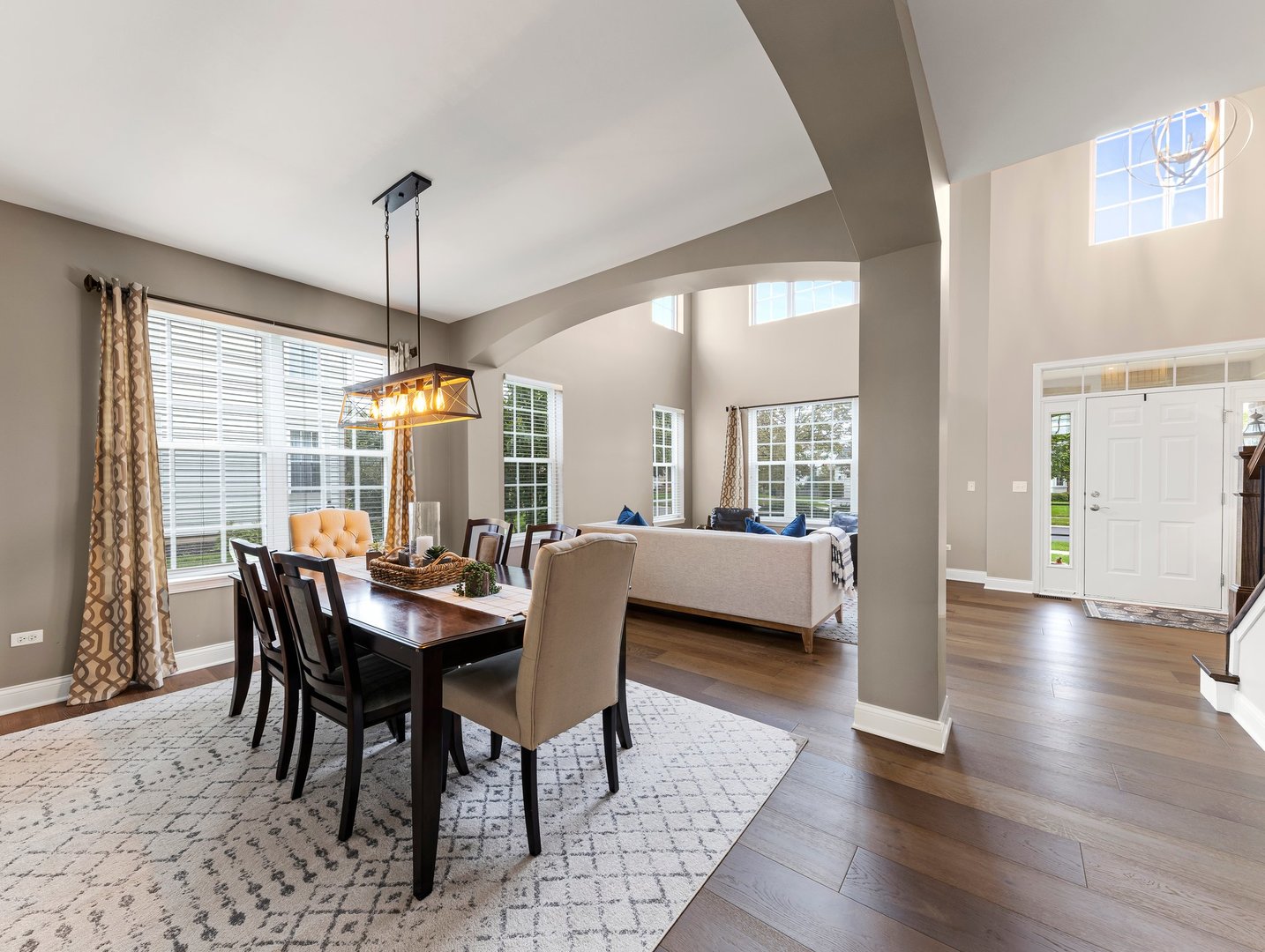 26305 Mapleview Drive Plainfield, IL 60585 - Photo 8 of 40 a view of a dining room with furniture window and wooden floor