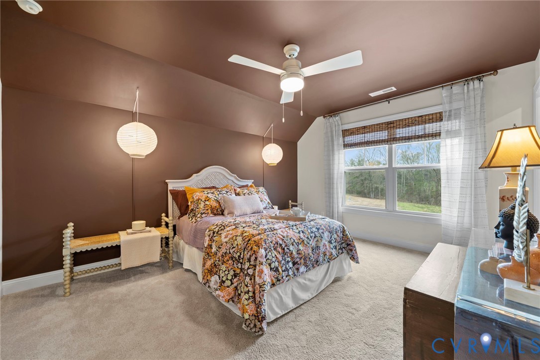 Lot 33 Tuckmar Ridge Drive Moseley, VA 23120 - Photo 15 of 21 a bedroom with a bed and a large window