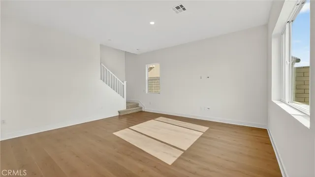 an empty room with windows