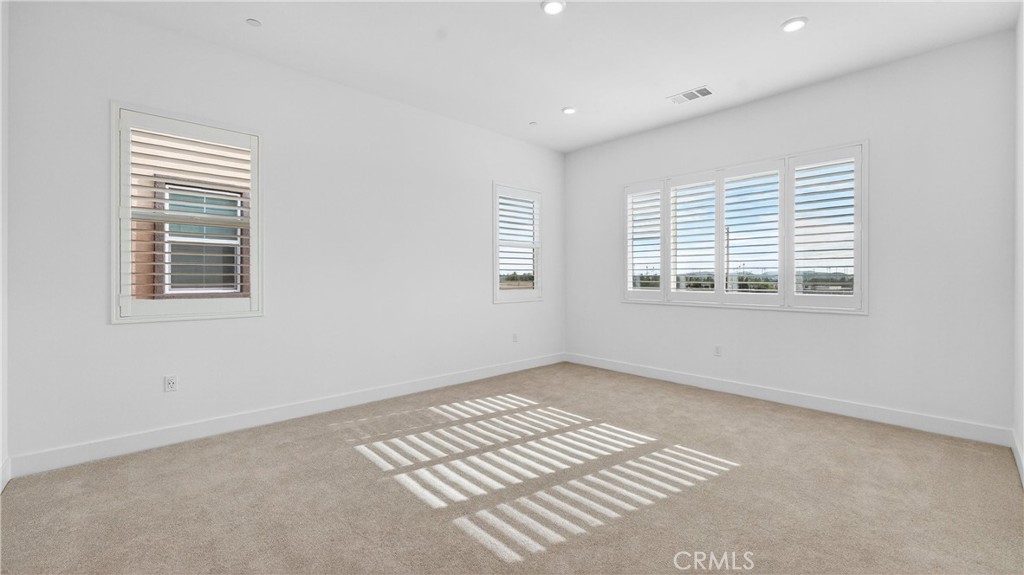224 Lily Loop Irvine, CA 92618 - Photo 27 of 39 a view of an empty room with a window