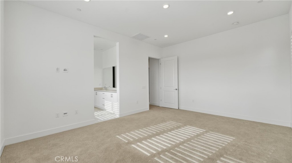 224 Lily Loop Irvine, CA 92618 - Photo 29 of 39 a view of a room with a sink and cabinets