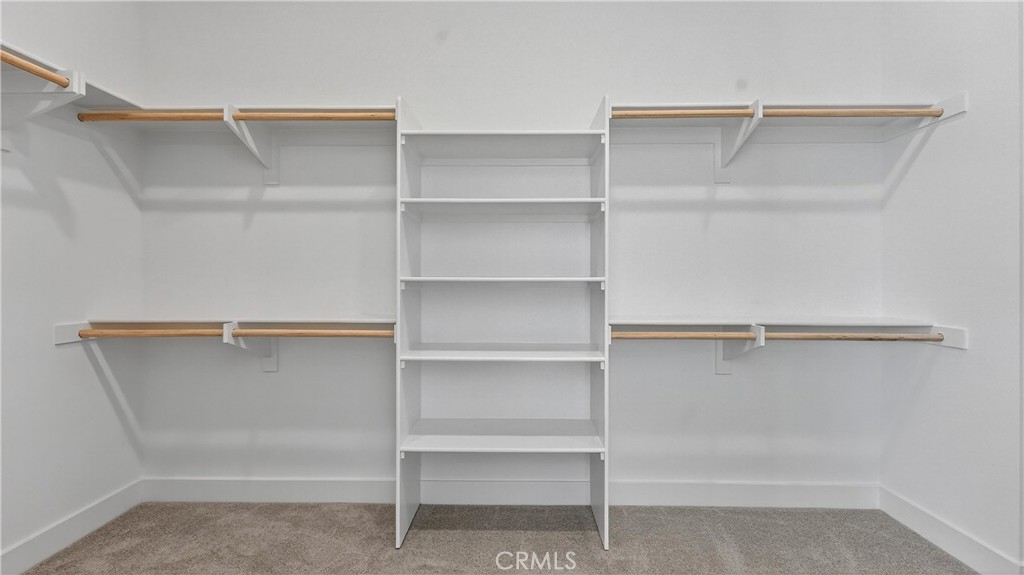 224 Lily Loop Irvine, CA 92618 - Photo 30 of 39 a view of an empty walk in closet