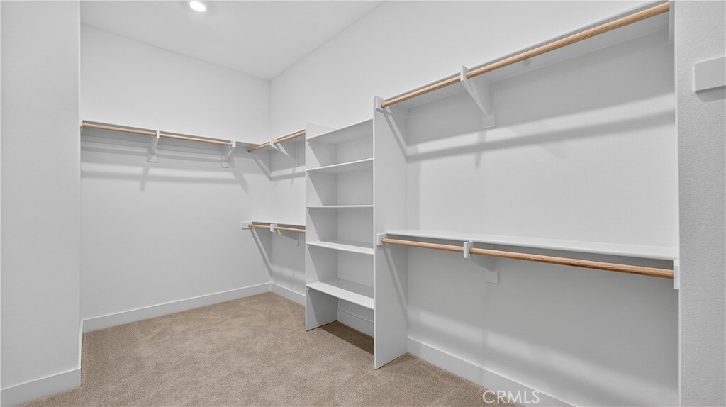 224 Lily Loop Irvine, CA 92618 - Photo 31 of 39 a view of an empty walk in closet