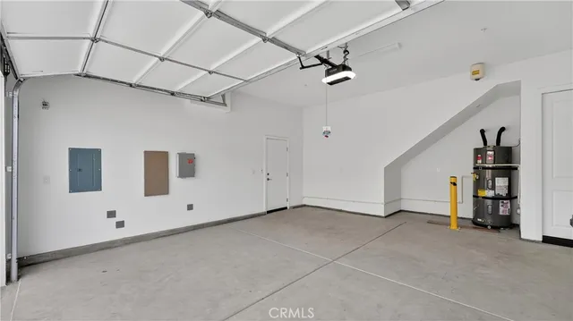 a view of residential houses with a lake view