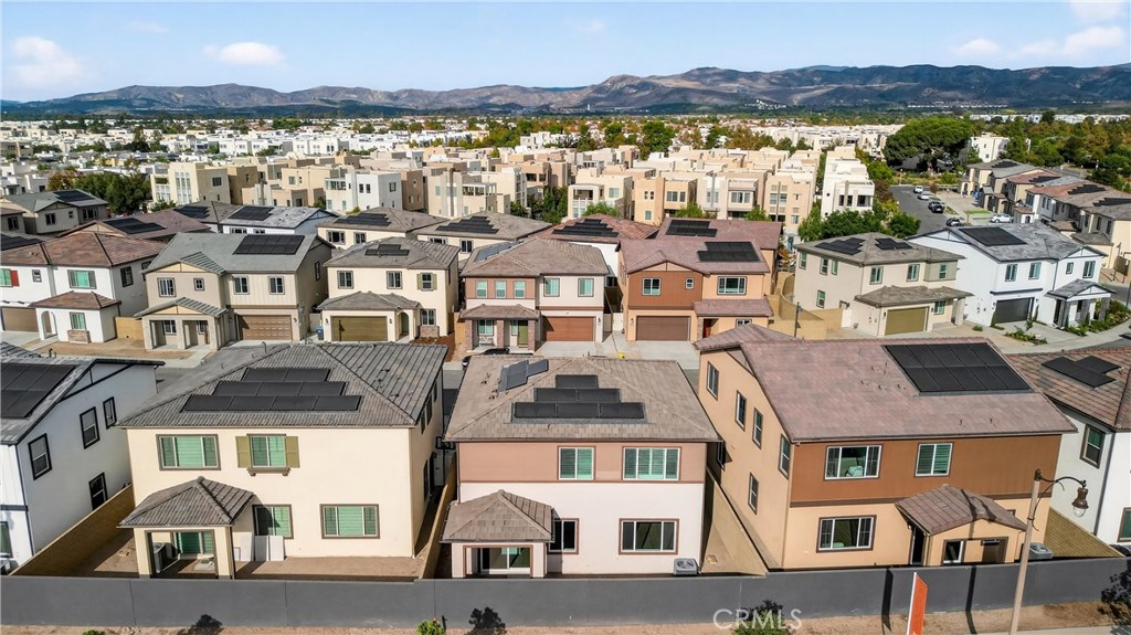 224 Lily Loop Irvine, CA 92618 - Photo 37 of 39 a view of residential houses with a lake view
