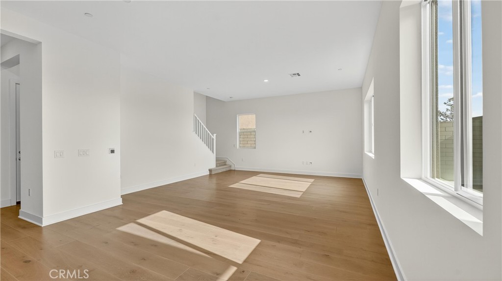 224 Lily Loop Irvine, CA 92618 - Photo 10 of 39 an empty room with windows