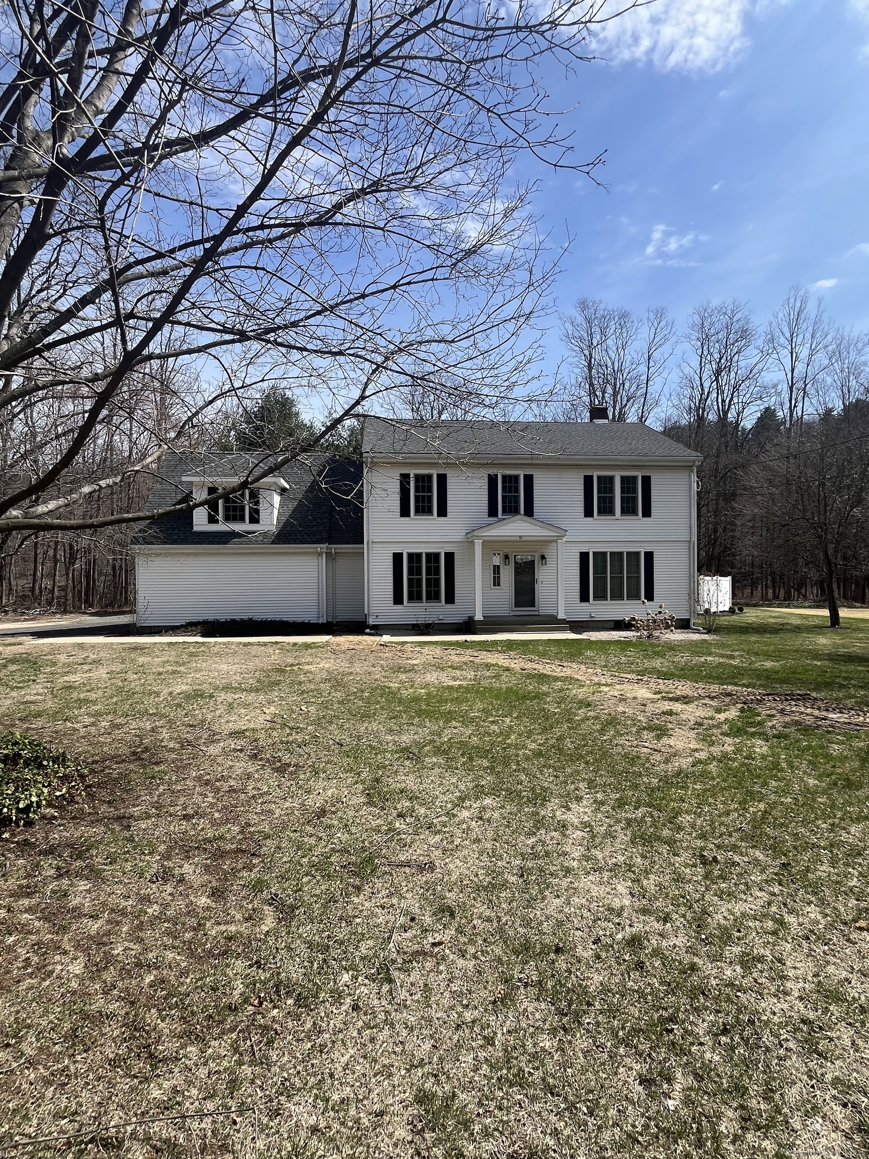 61 Arch Street, Unit 1 Burlington, CT 06013 - Photo 1 of 22 a house view with a outdoor space