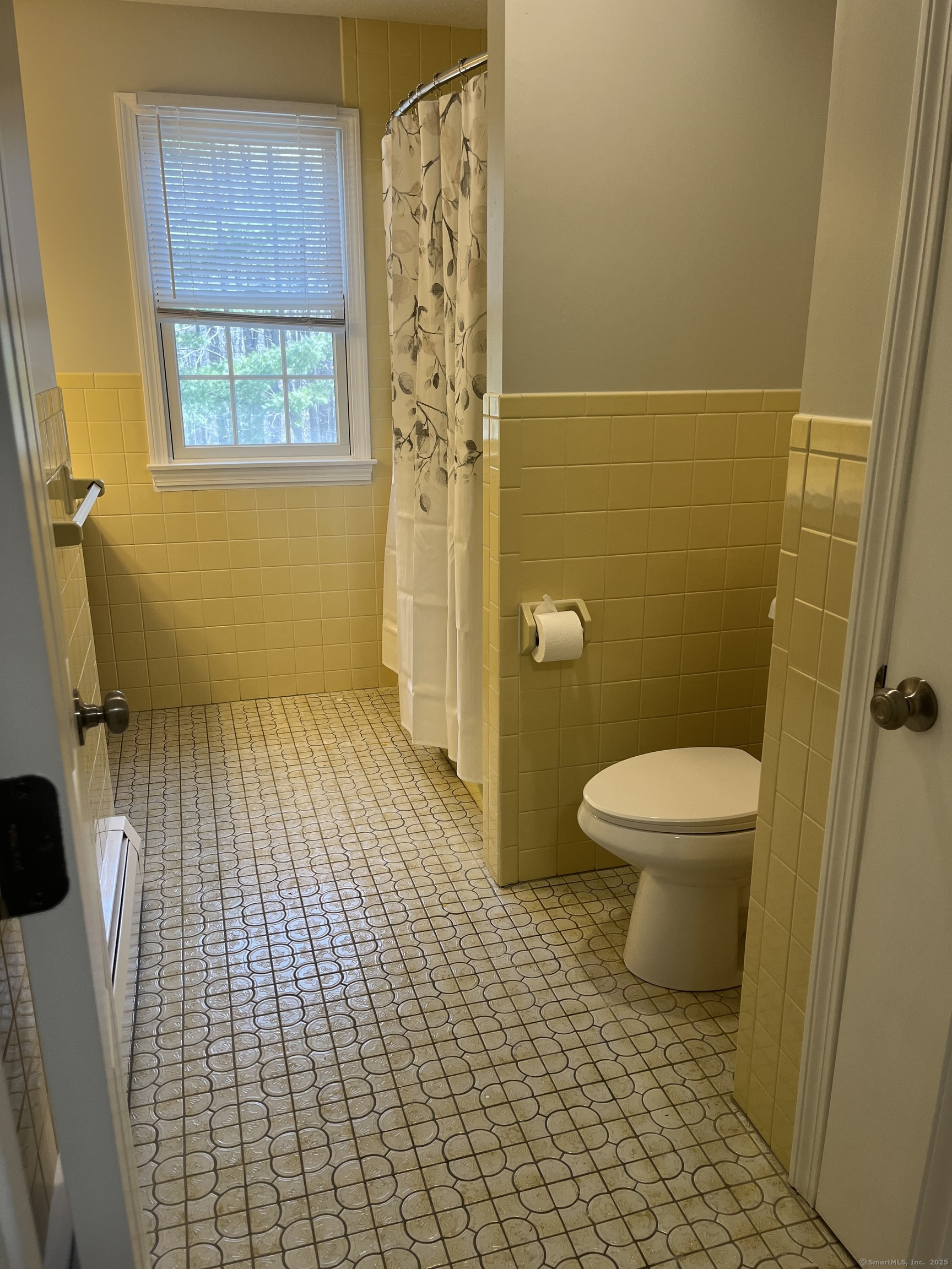 61 Arch Street, Unit 1 Burlington, CT 06013 - Photo 15 of 22 a bathroom with a toilet and a shower