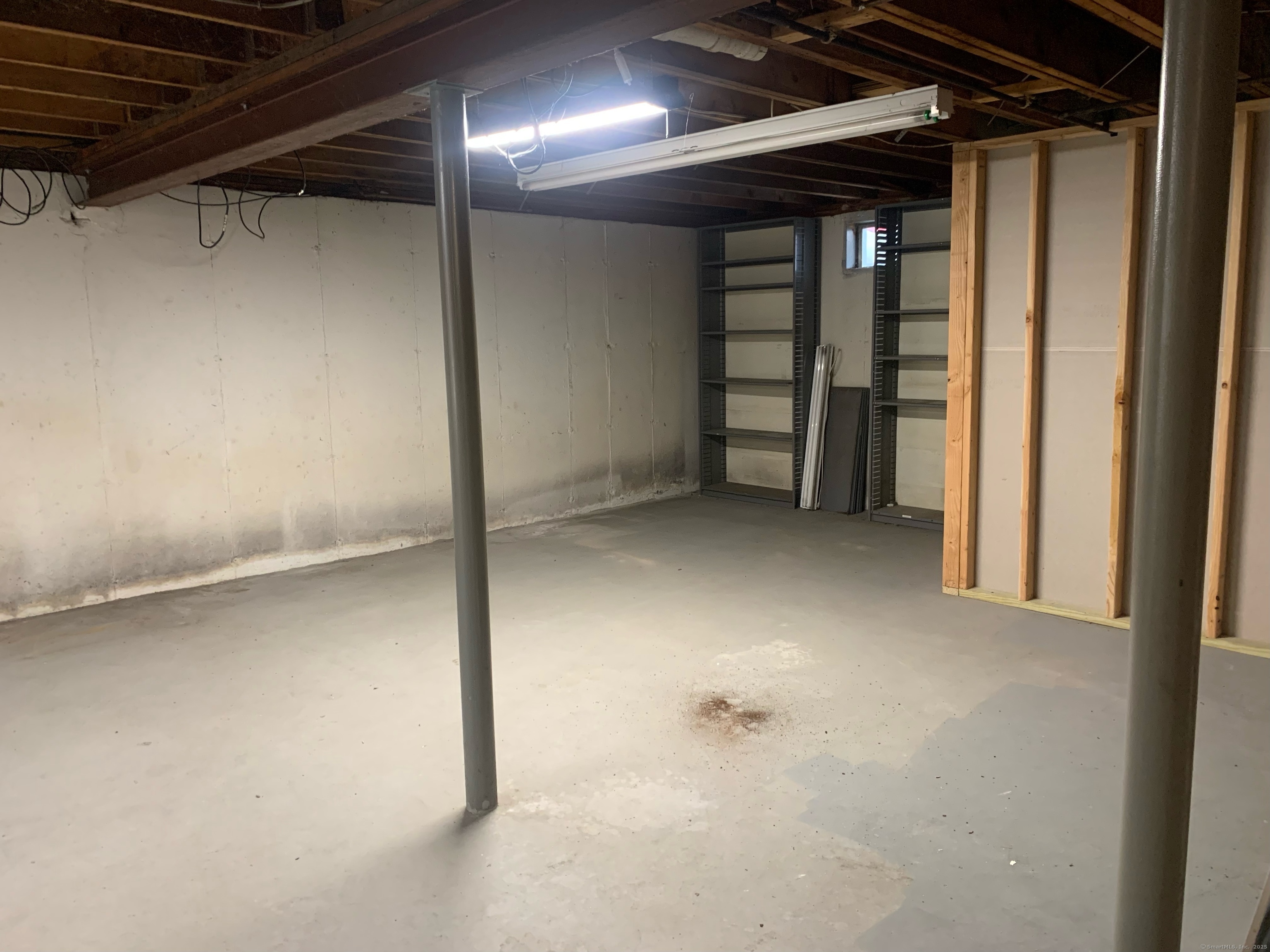 61 Arch Street, Unit 1 Burlington, CT 06013 - Photo 22 of 22 a view of an empty room