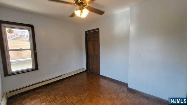 47 Hackensack Avenue Ridgefield Park, NJ 07660 - Photo 26 of 36 an empty room with windows and fan
