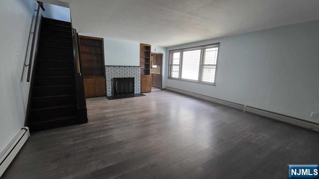 47 Hackensack Avenue Ridgefield Park, NJ 07660 - Photo 7 of 36 wooden floor in an empty room with a window