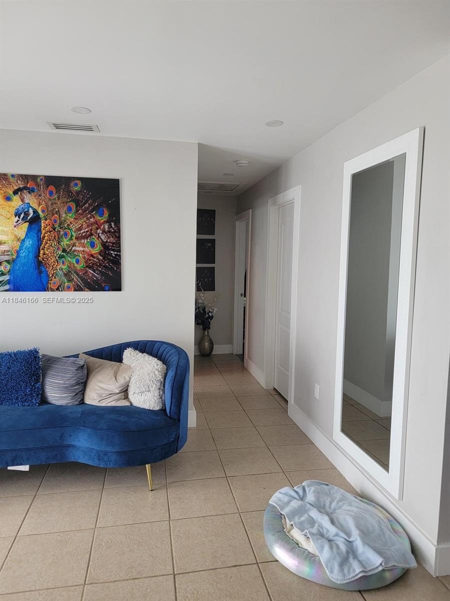 30730 Southwest 156th Avenue Homestead, FL 33033 - Photo 11 of 24 a living room with furniture and a rug
