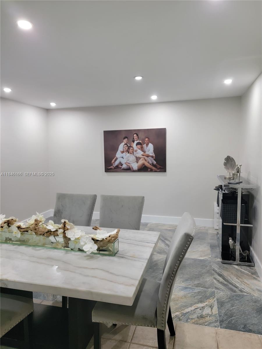 30730 Southwest 156th Avenue Homestead, FL 33033 - Photo 22 of 24 a view of a dining room with furniture