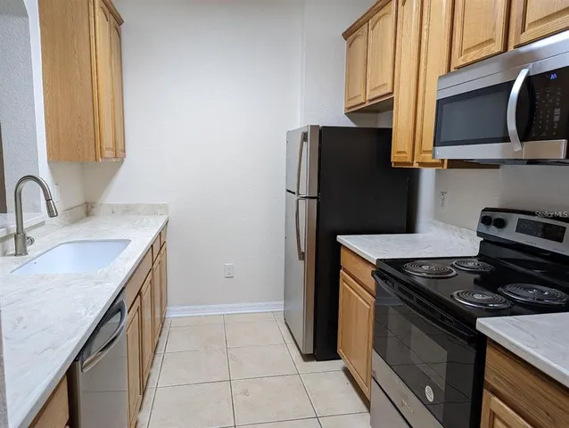 $1,695 | 1355 Venezia Court, Unit 201, Davenport, FL 33896