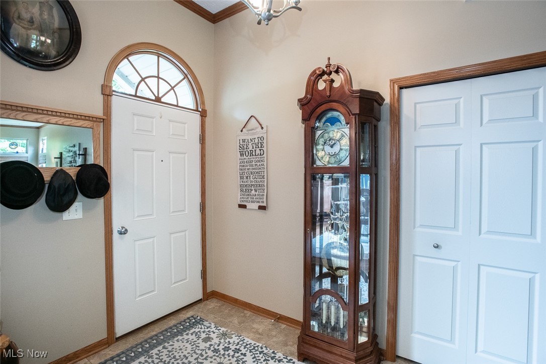 126 Timber Ridge Drive Elyria, OH 44035 - Photo 7 of 49 Foyer featuring baseboards and light tile patterned floors