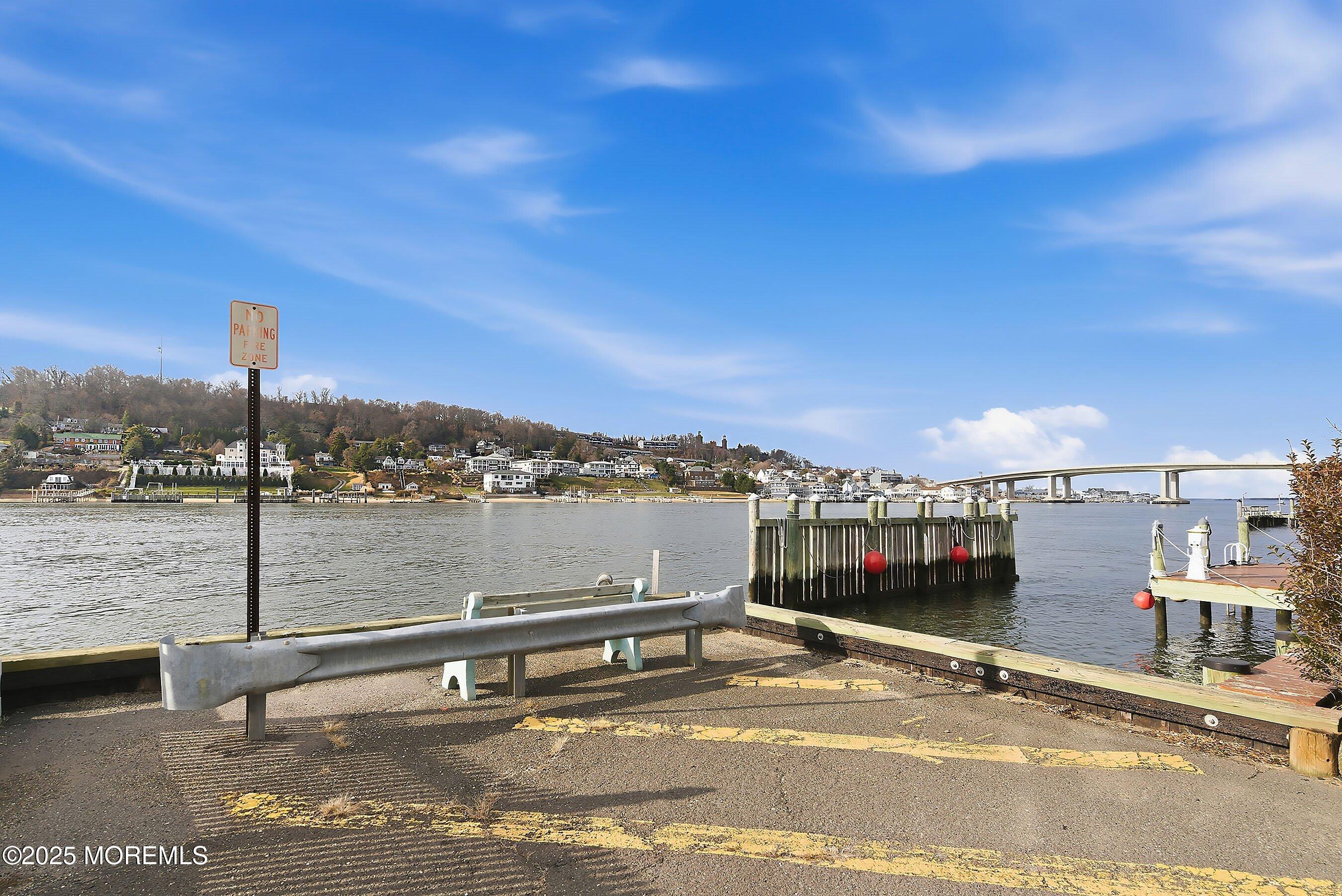 34 Waterview Way Sea Bright, NJ 07760 - Photo 19 of 24 a view of a terrace with a bench