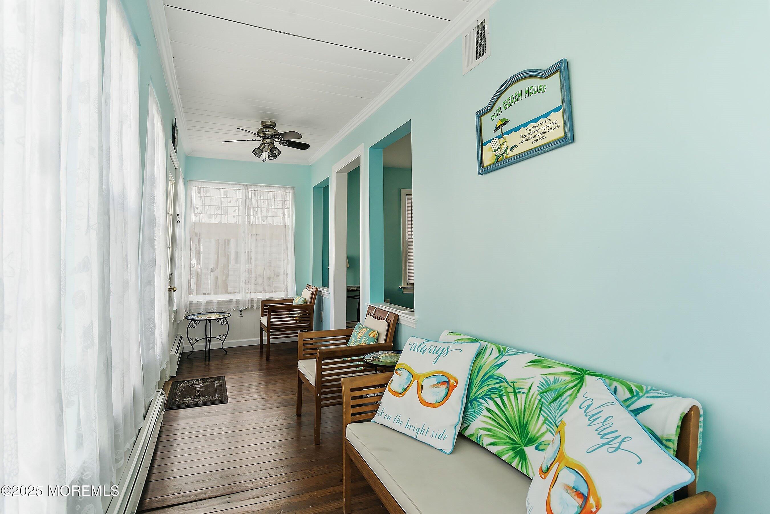 34 Waterview Way Sea Bright, NJ 07760 - Photo 4 of 24 a living room with furniture and a window