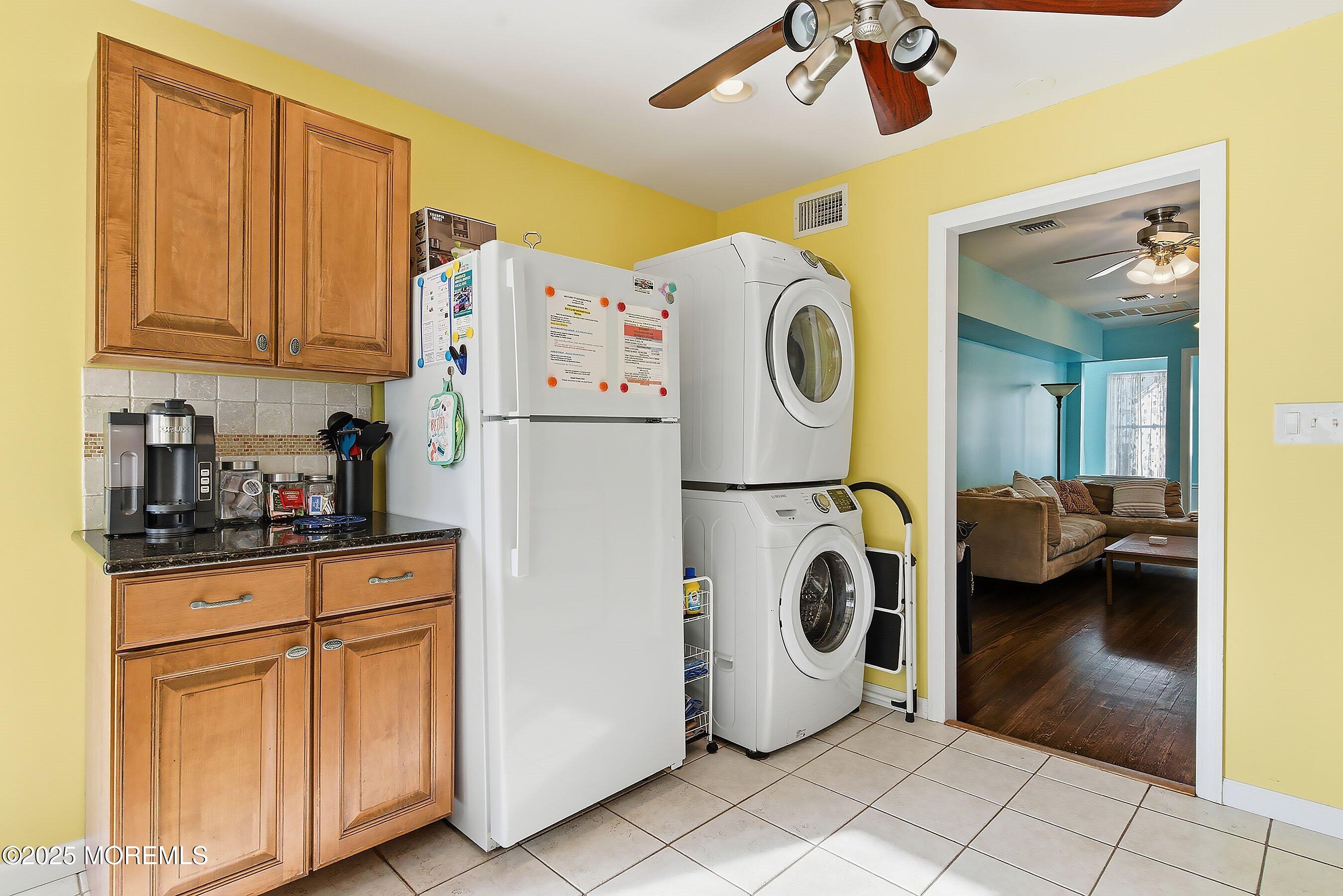 34 Waterview Way Sea Bright, NJ 07760 - Photo 6 of 24 a utility room with dryer and washer