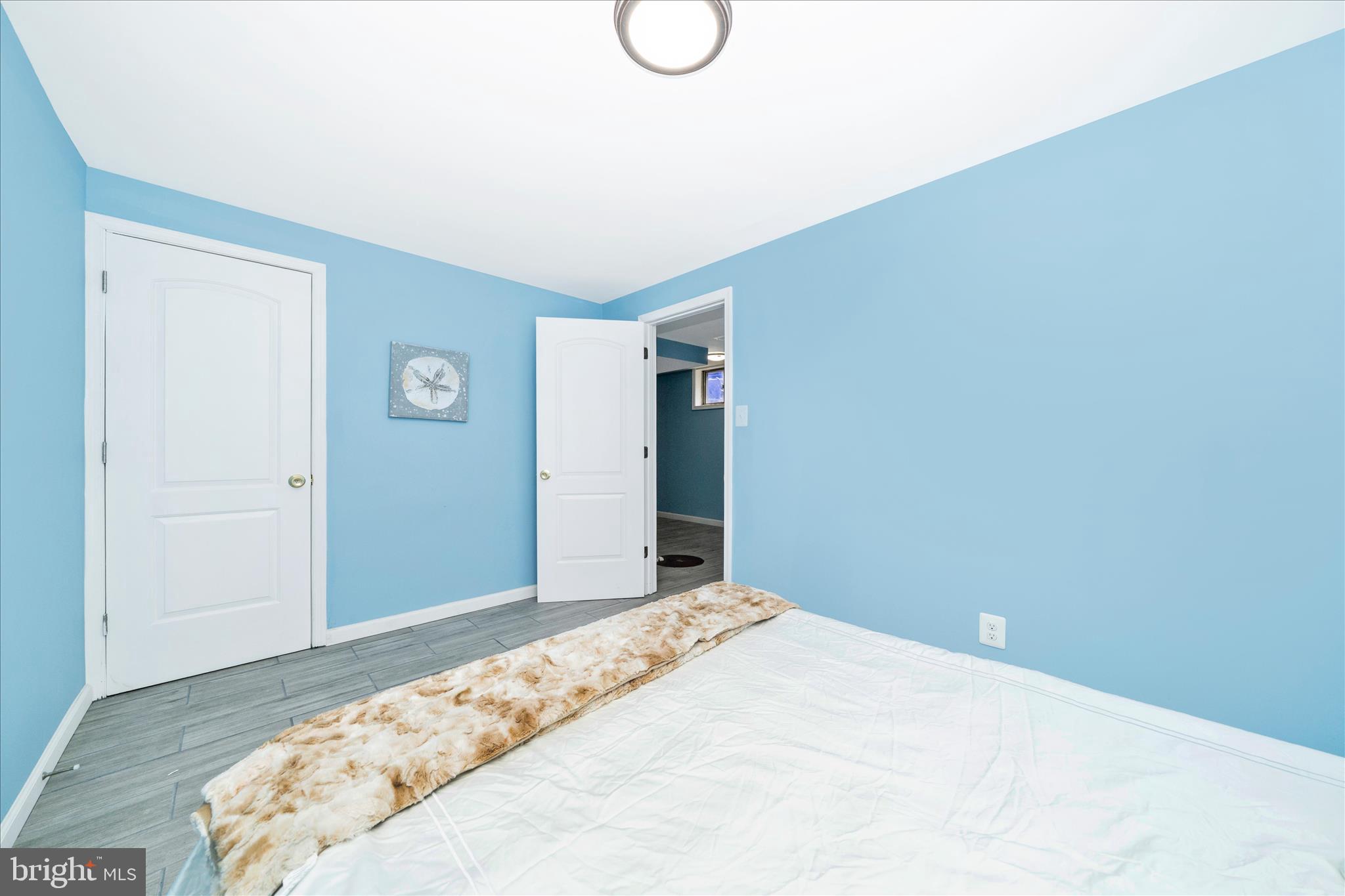 713 Seek Lane Silver Spring, MD 20912 - Photo 37 of 60 a bedroom with a bed and a window