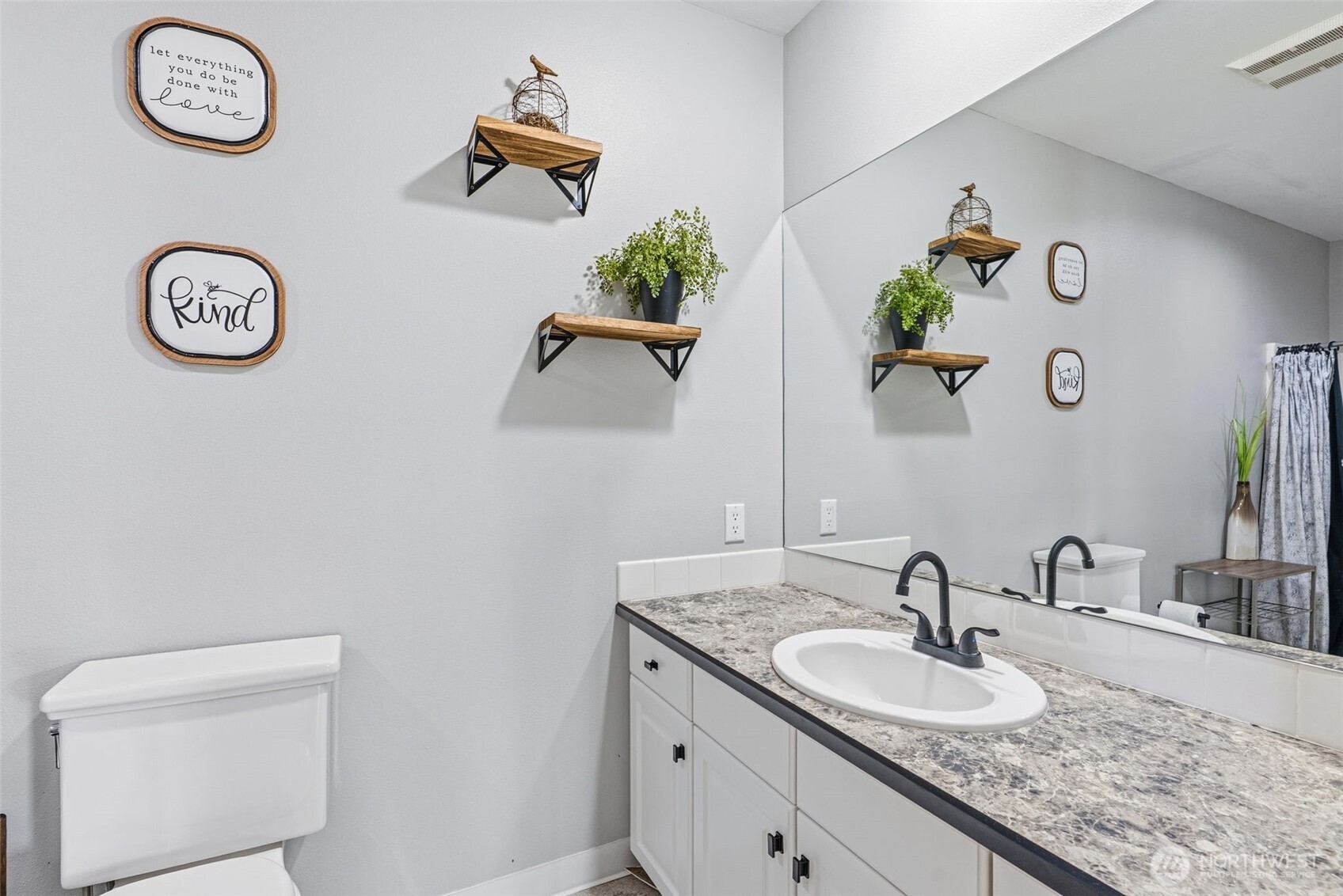 16 Little Cape Horn Road Cathlamet, WA 98612 - Photo 20 of 32 a bathroom with a sink and a mirror